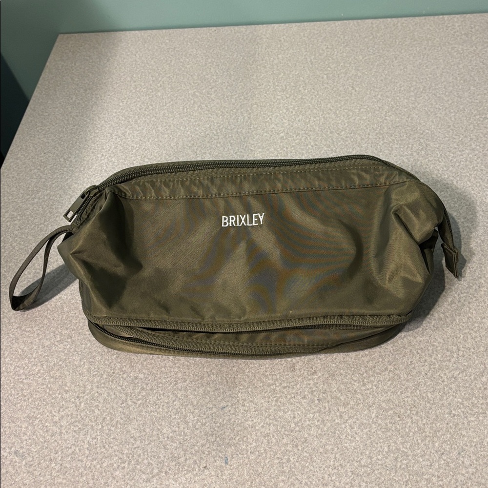 Brixley Toiletry Bag. GUC Very clean inside. Some wear on bottom.  See photos.